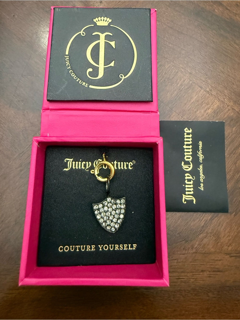 Juicy Couture Gold-Tone Crystal Shield Pendant with Pink Gift Box